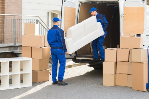 Removalist truck and packed boxes ready for a Greenwich home relocation