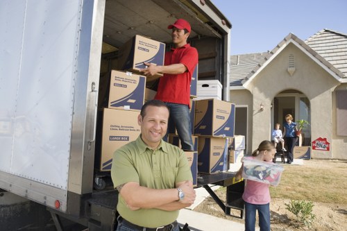 Urgent relocation service with boxes and furniture in Greenwich
