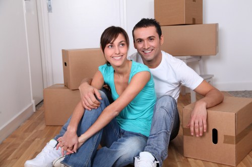 Professional movers loading furniture in Greenwich