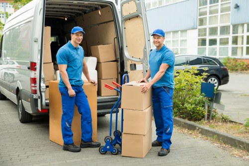 Driver securing cargo safely inside a moving van