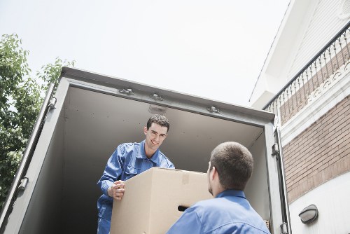 Packed office boxes and furniture ready for transport in Greenwich