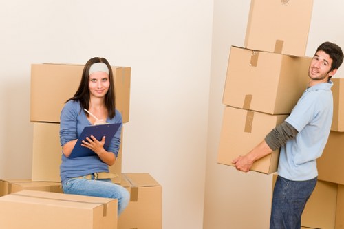 Packed living room ready for a Greenwich home relocation